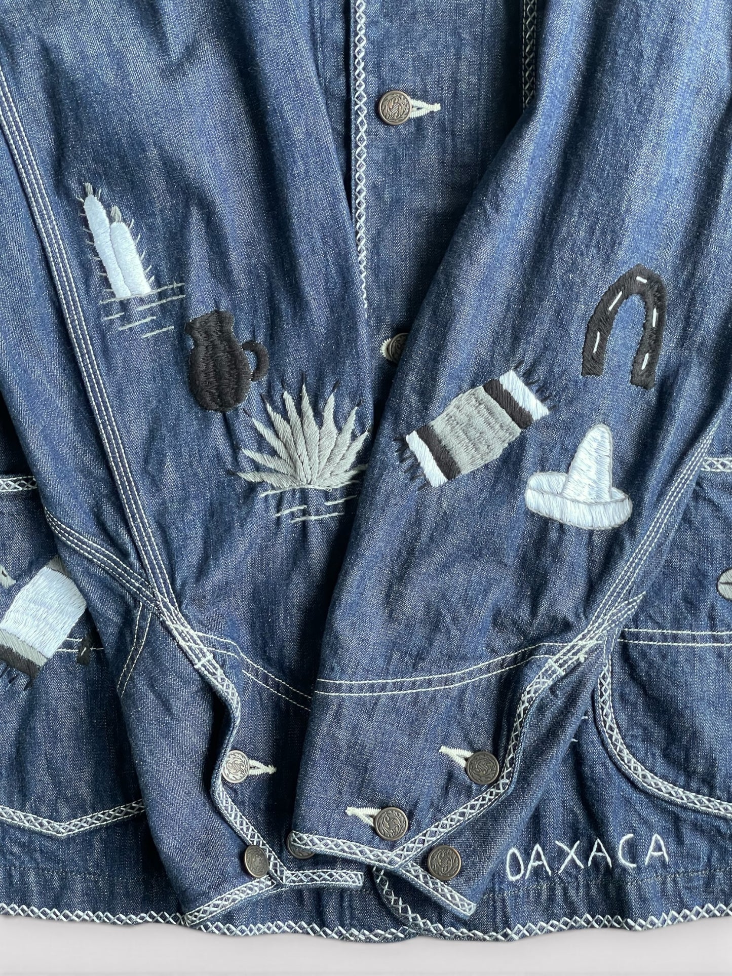 B T R × Lucy OAXACA Souvenir Coverall Jacket
