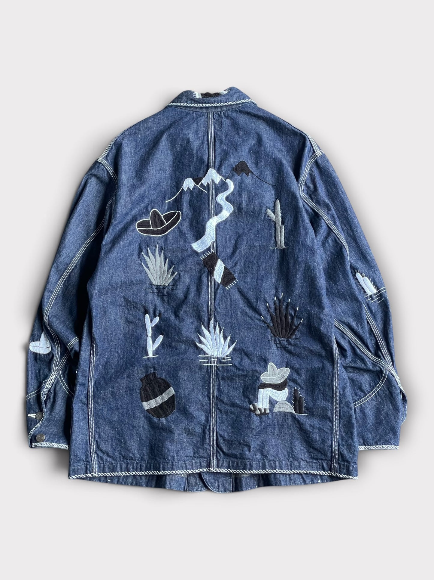 B T R × Lucy OAXACA Souvenir Coverall Jacket